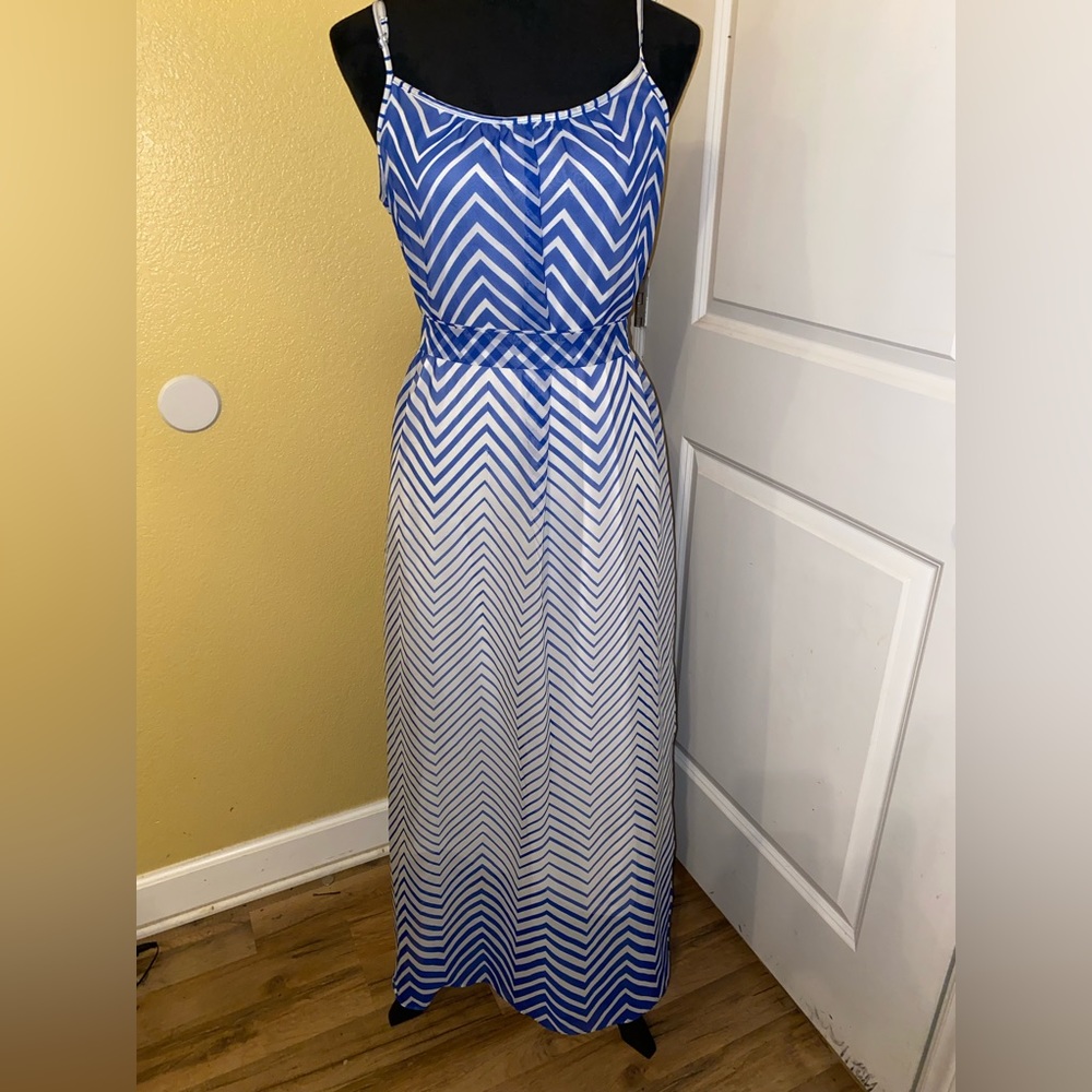 Blue white color dress. Good condition. Size: 4.